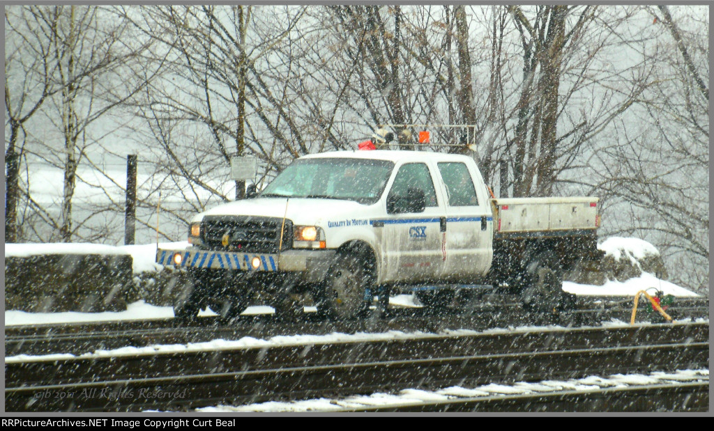 hi-railer in a snowstorm